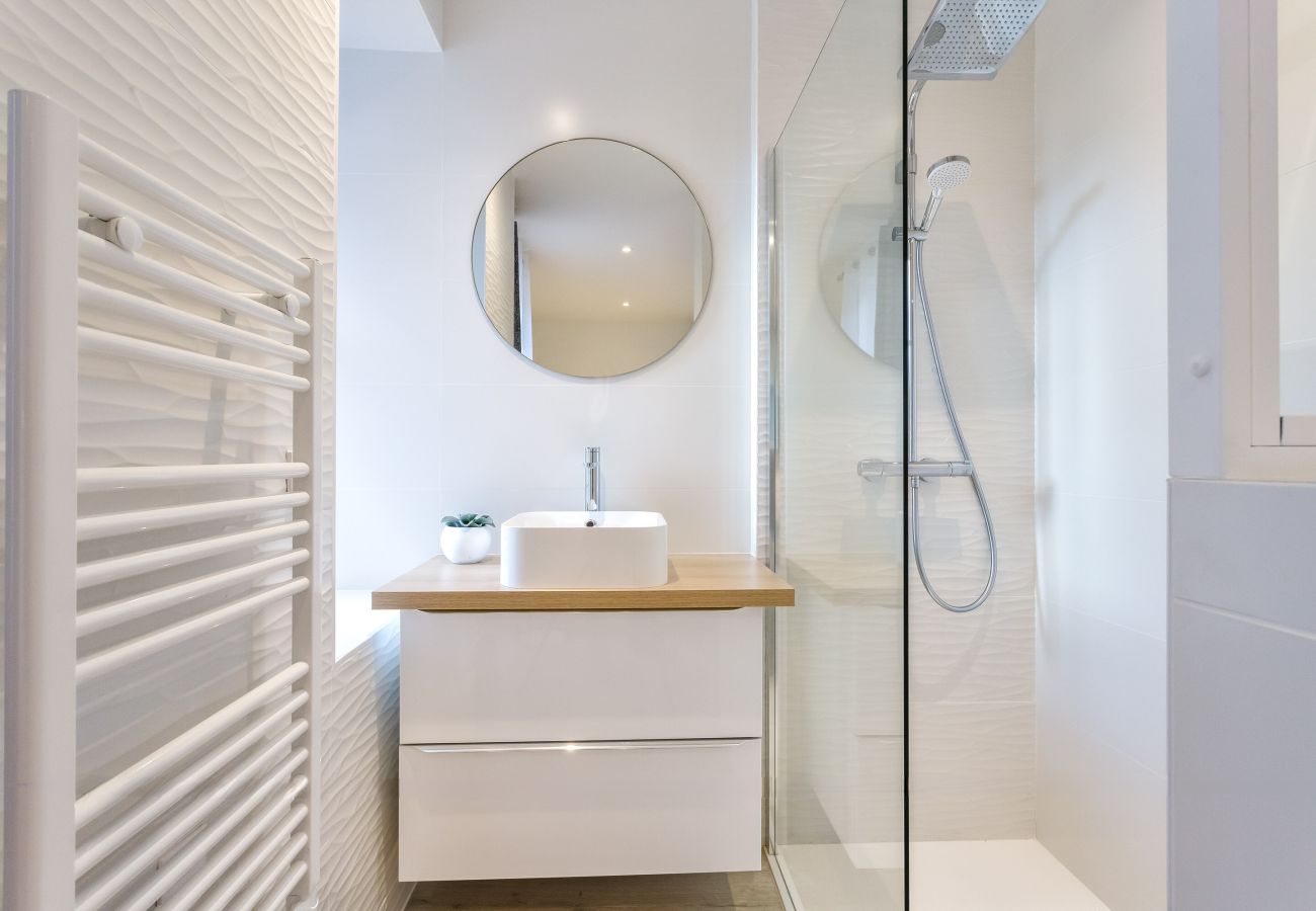 Modern shower room with walk-in shower and sink