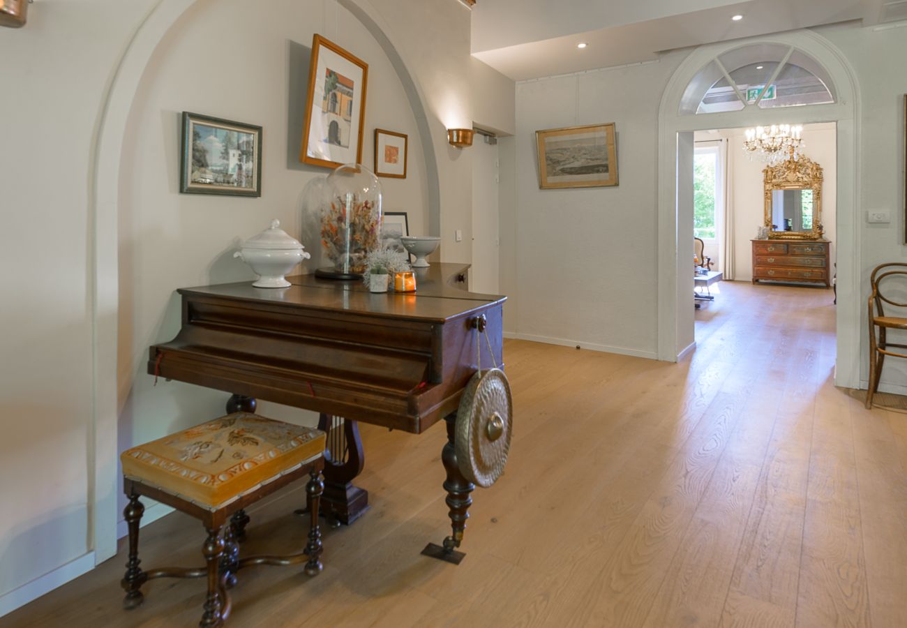 Enjoying convivial moments by the piano