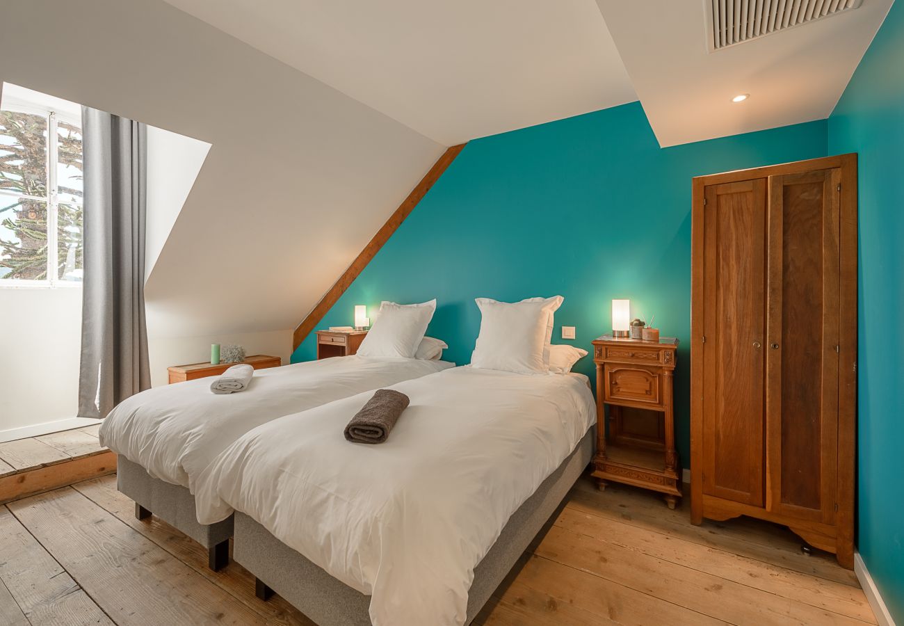 Luxurious lakeside bedroom in a prestigious estate