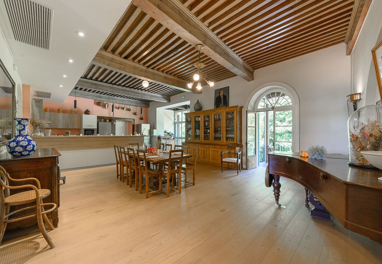 Gathering around the piano with terrace access