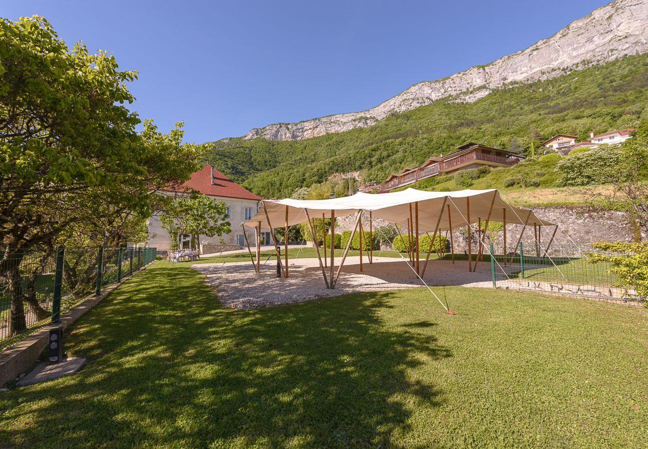 Landscaped garden with nomadic tent, perfect for hosting large events