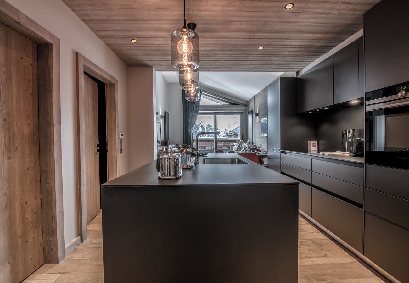 Appartement location saisonnière Courchevel pieds des pistes, airbnb luxe dans les alpes, ski in out proche du centre 