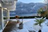 terrasse, jardin enneigé, neige, vue montagnes, vue lac, maison à la location, location saisonnière, propriété de luxe